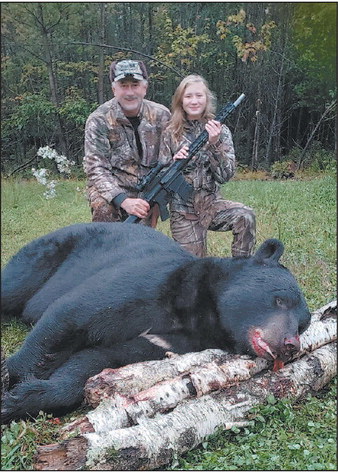 Local Girl Harvests  Potential State-Record Bear