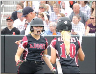 Lomira senior Rylee Baetz celebrates ….