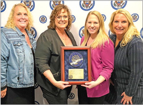 T.L.C. Does D.C., Accepts Blue Ribbon Award